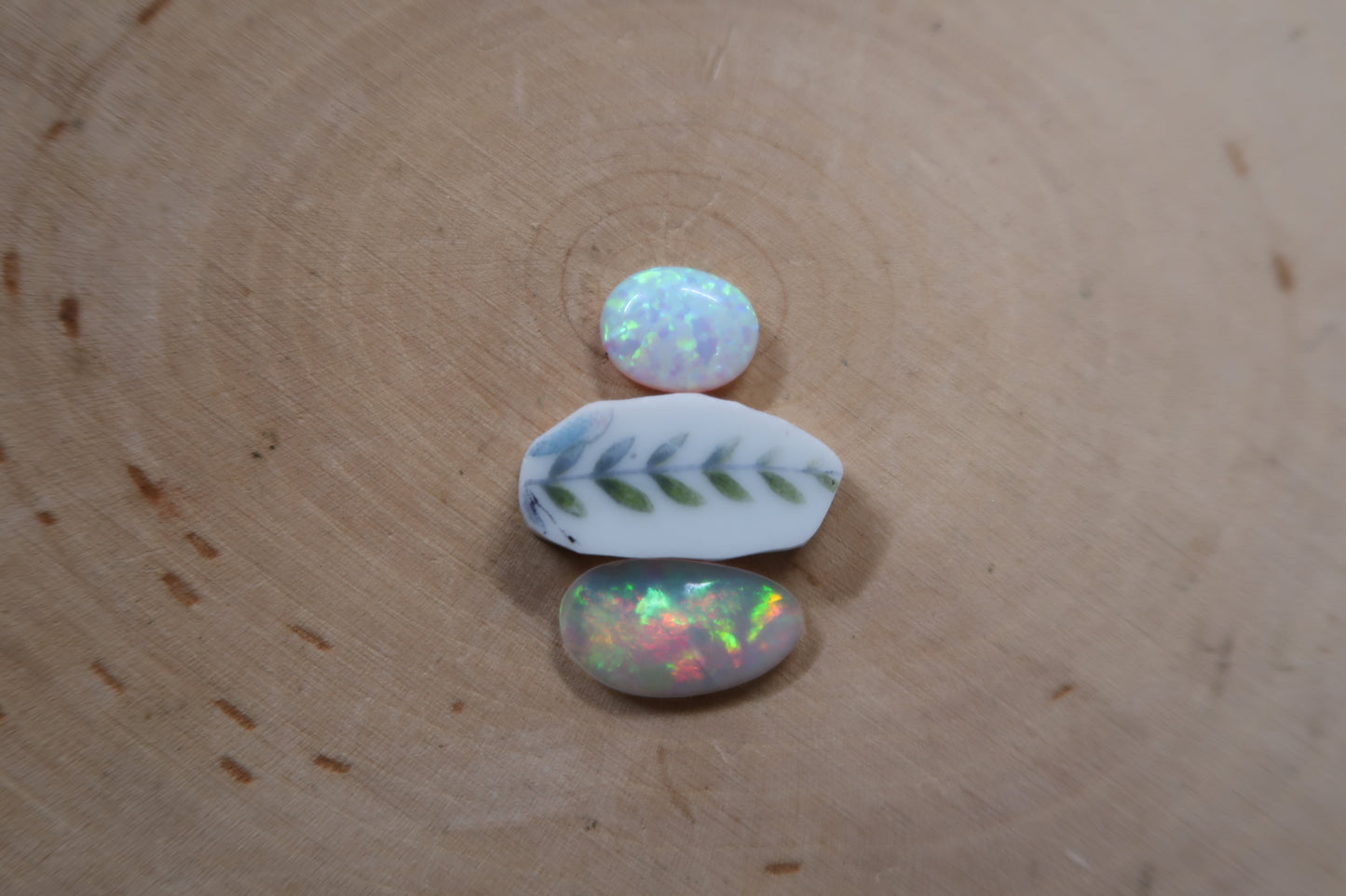 Ethiopian opal and ceramic leaf ring