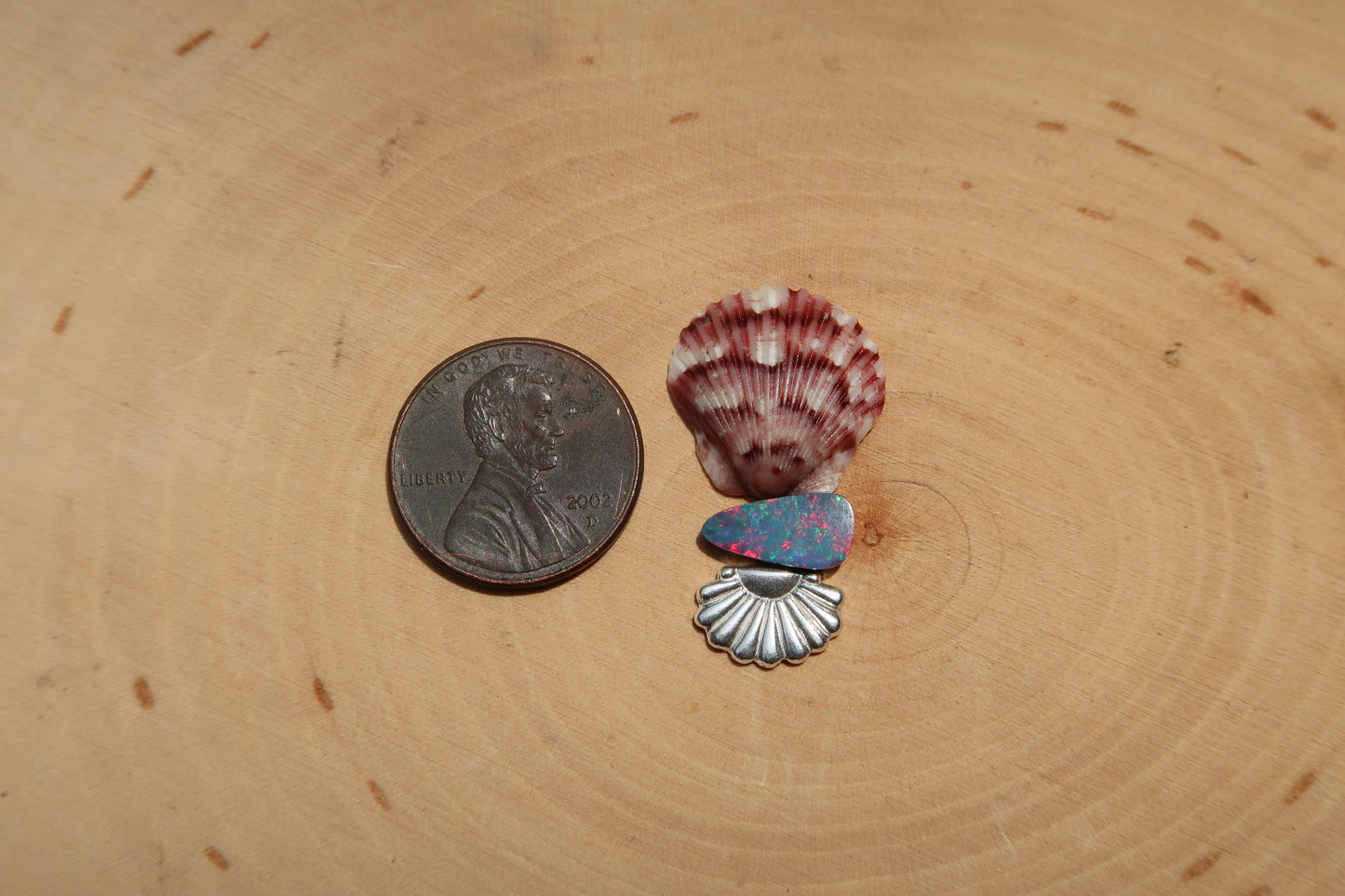 “Spark” shell and opal ring