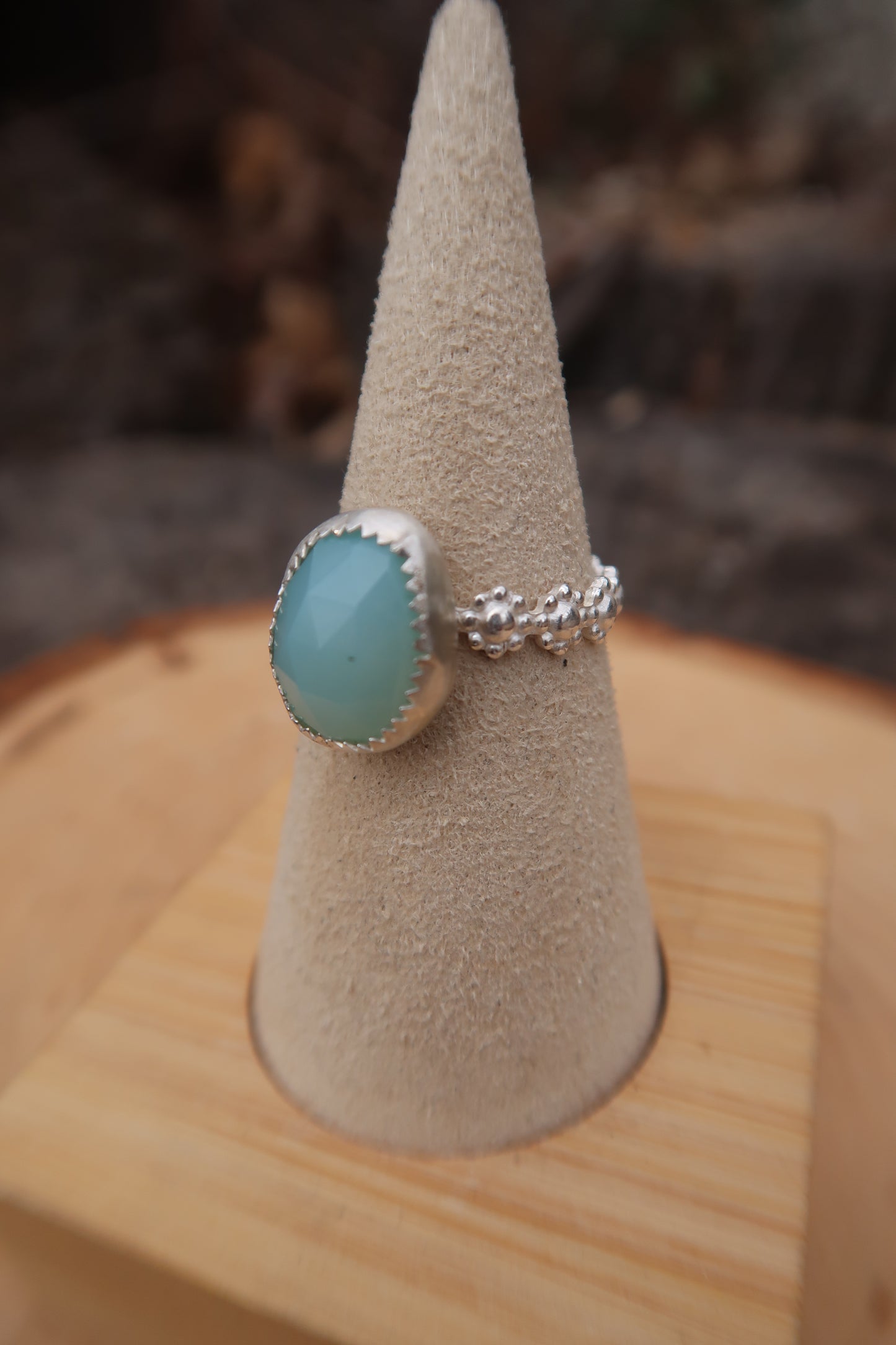 Aquamarine with daisy band size 7