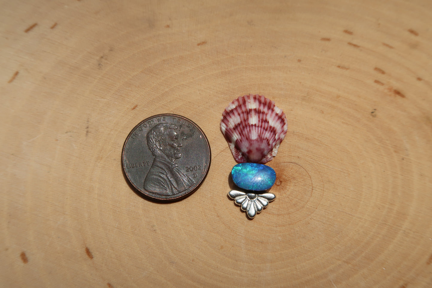 “Deep blue” shell and opal ring