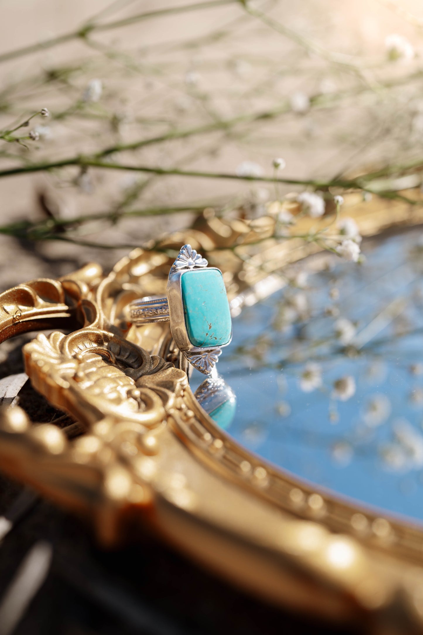 Turquoise with castings and flower band size 8.5