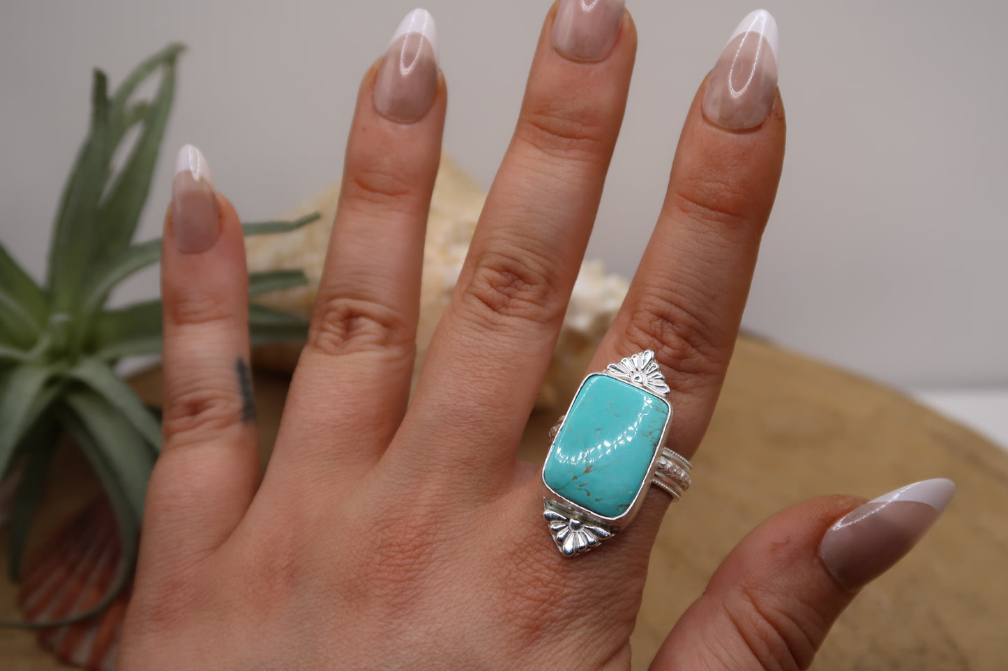 Turquoise with castings and flower band size 8.5
