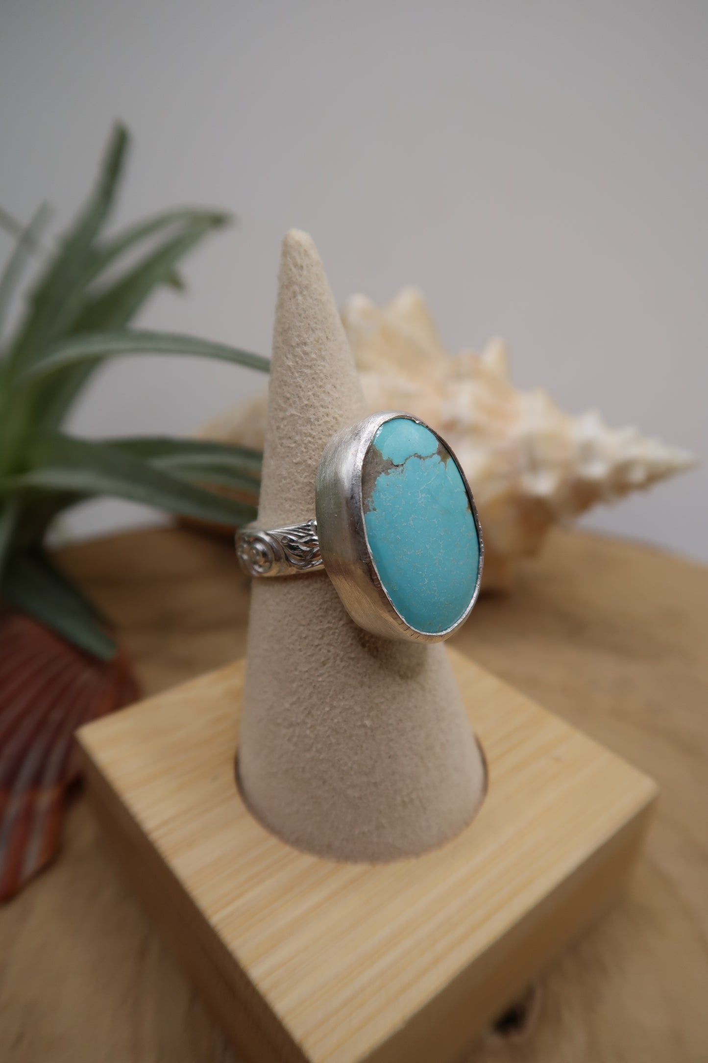Big turquoise on flower swirl band size 6.5