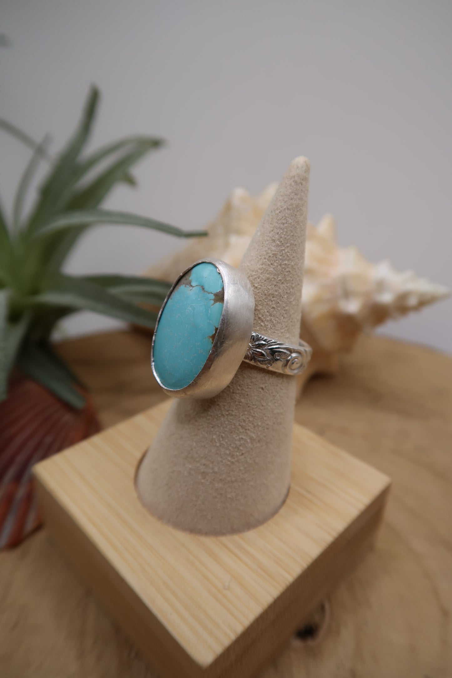 Big turquoise on flower swirl band size 6.5