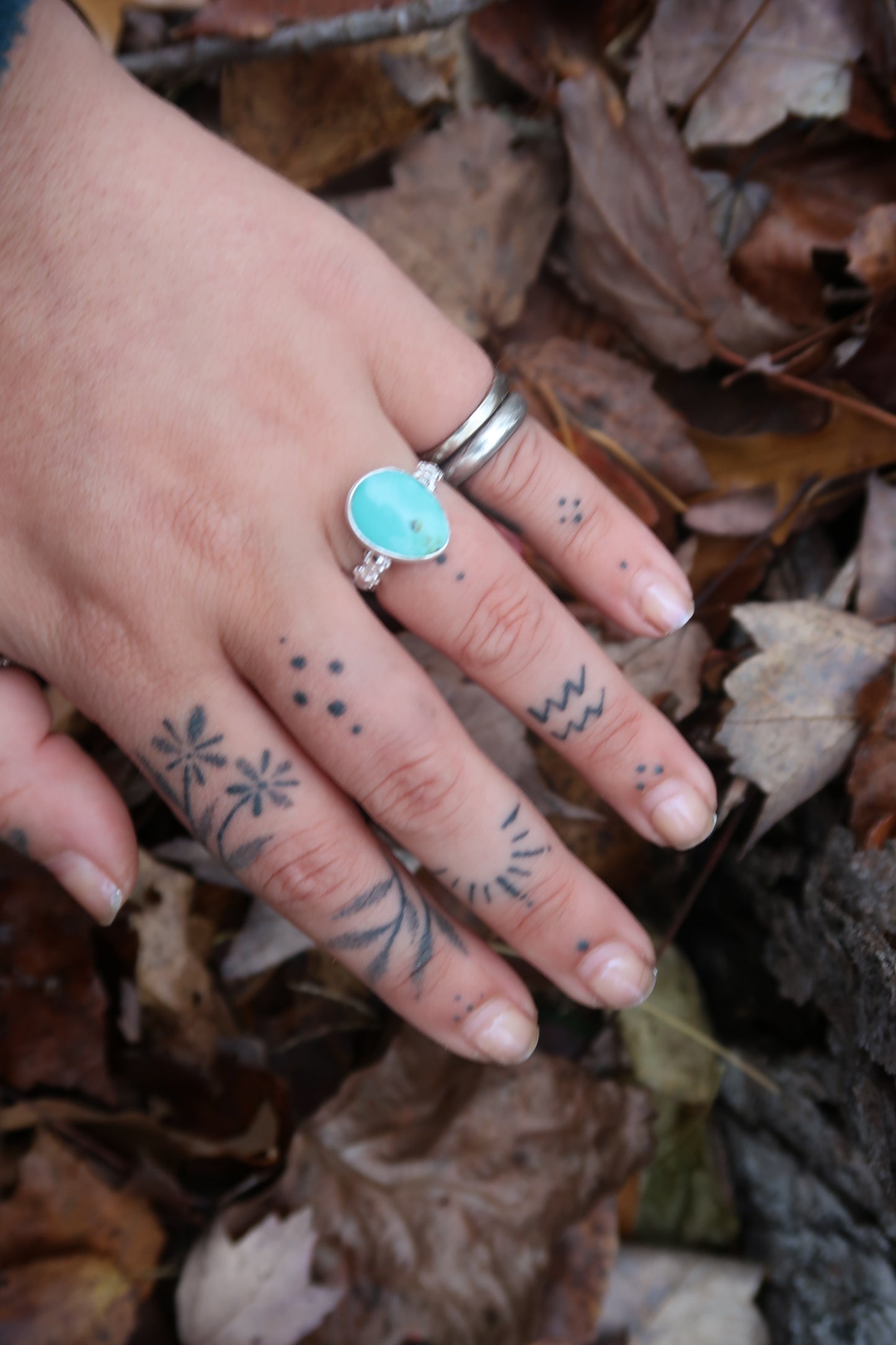 Turquoise with daisy band size 6.5