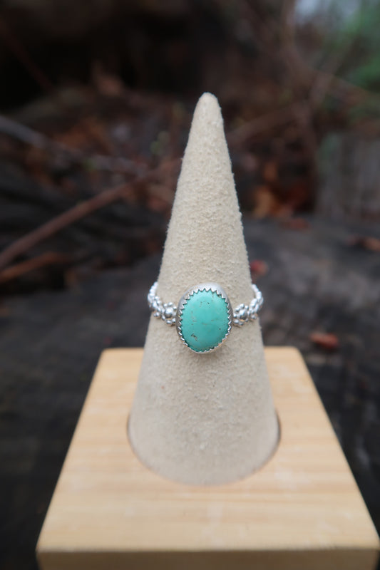 Turquoise on daisy band ring size 8