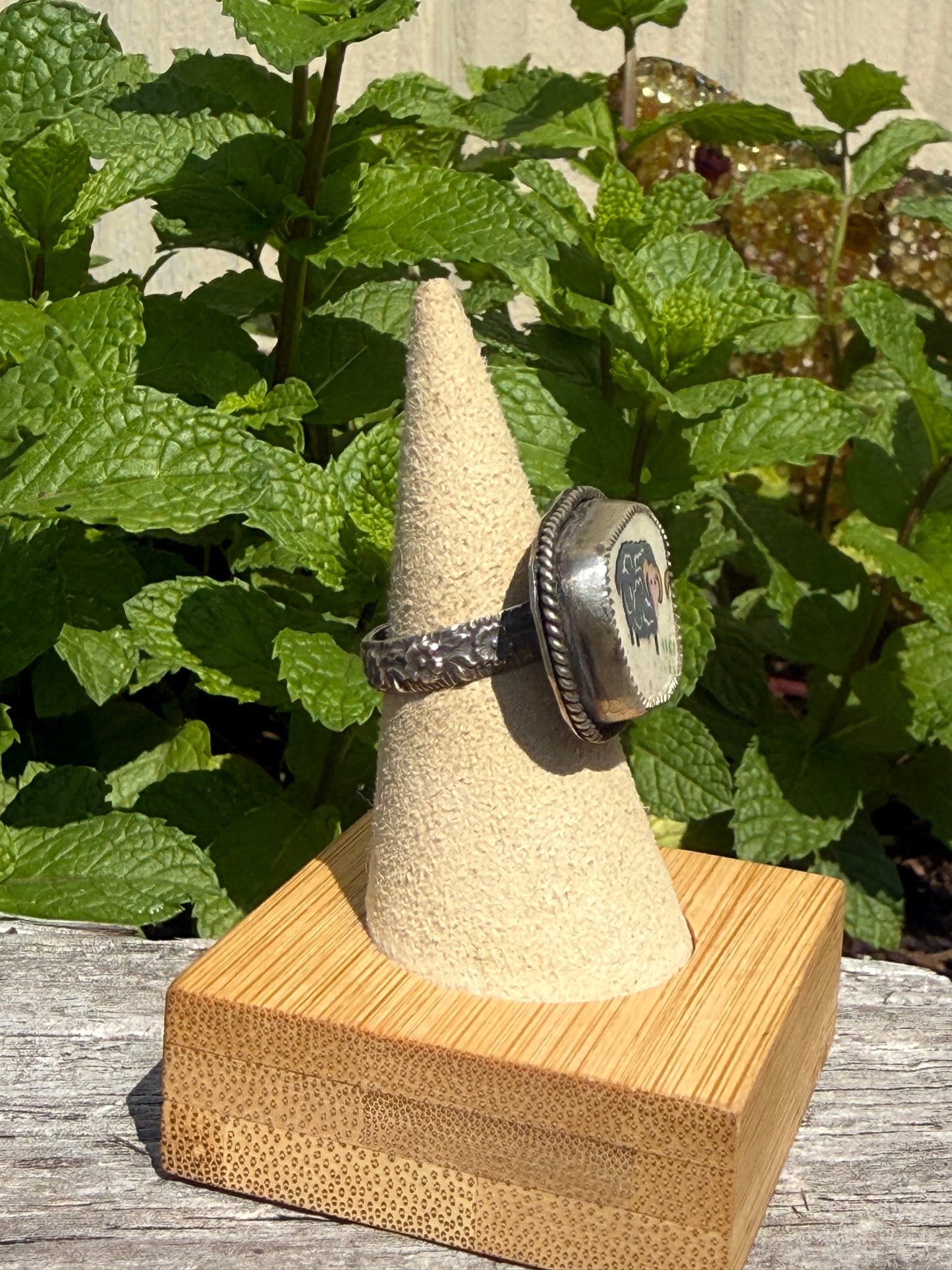 Black sheep ceramic ring on floral band size 7