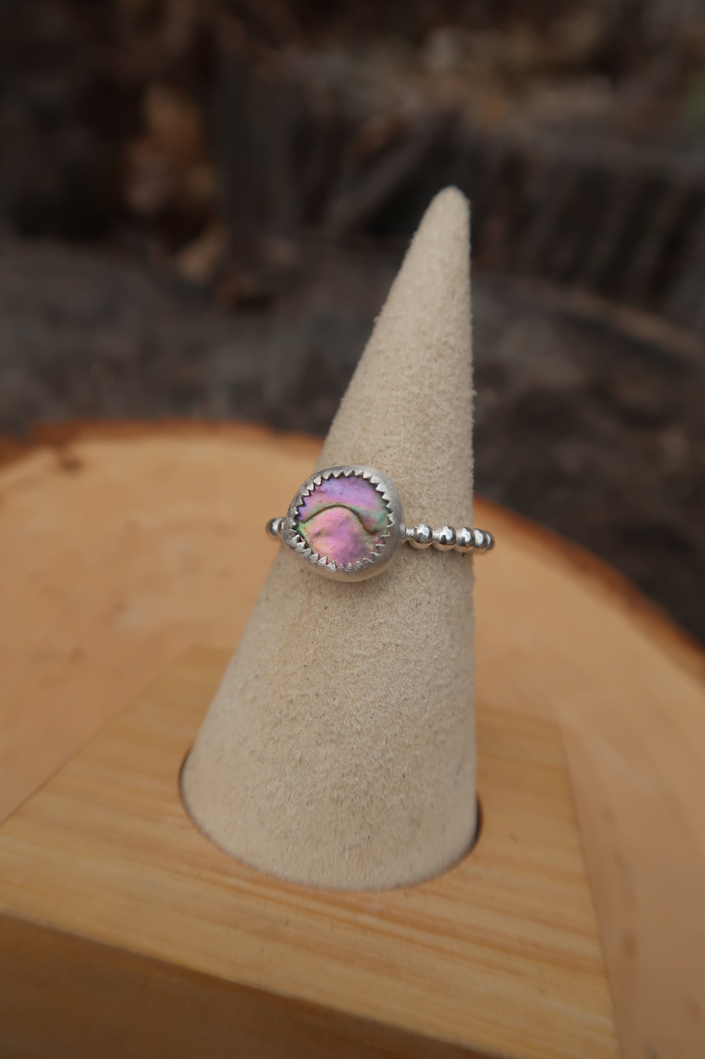 Pink abalone on beaded band size 8