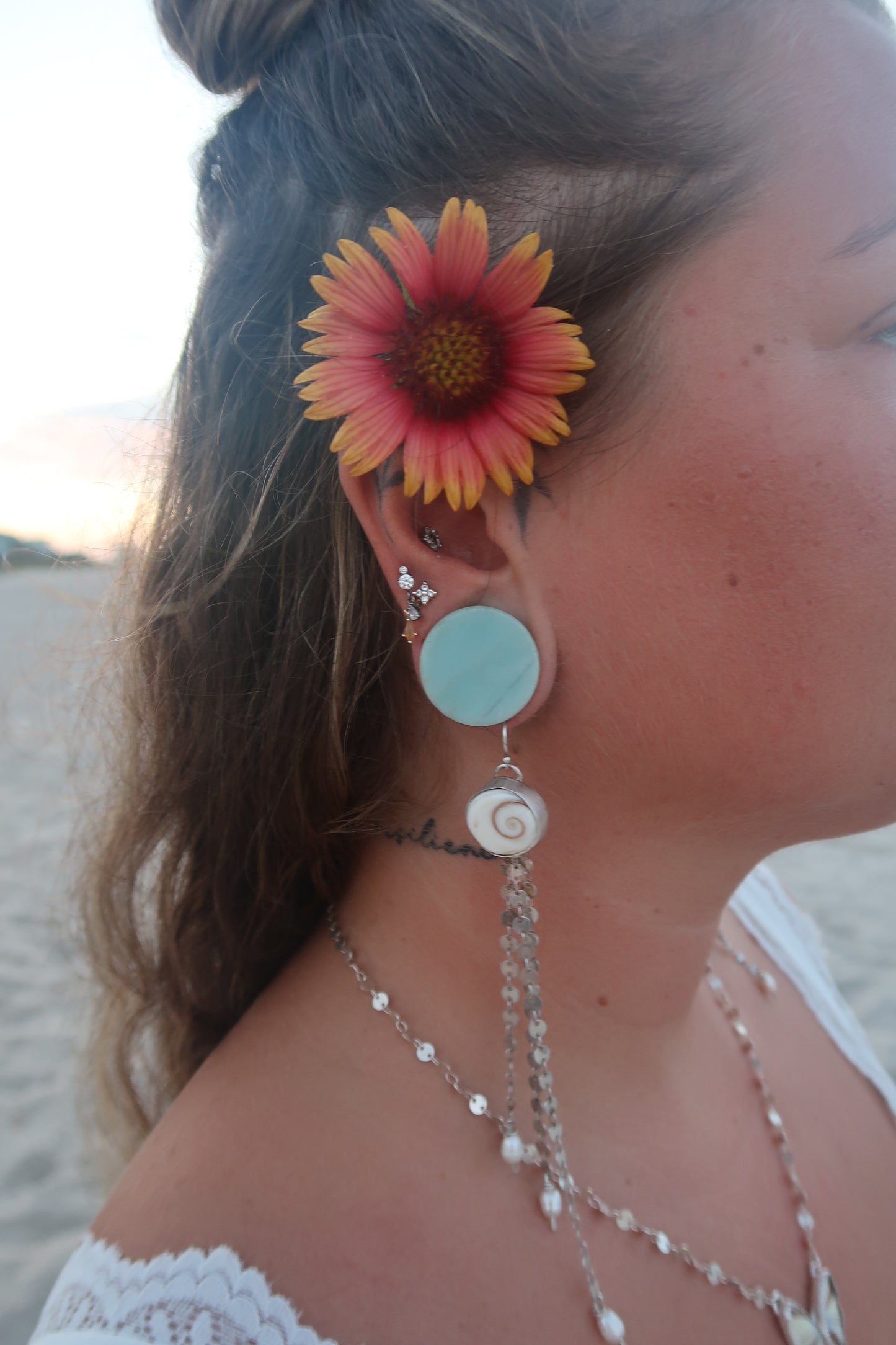 Shiva shell and pearl dangle earrings