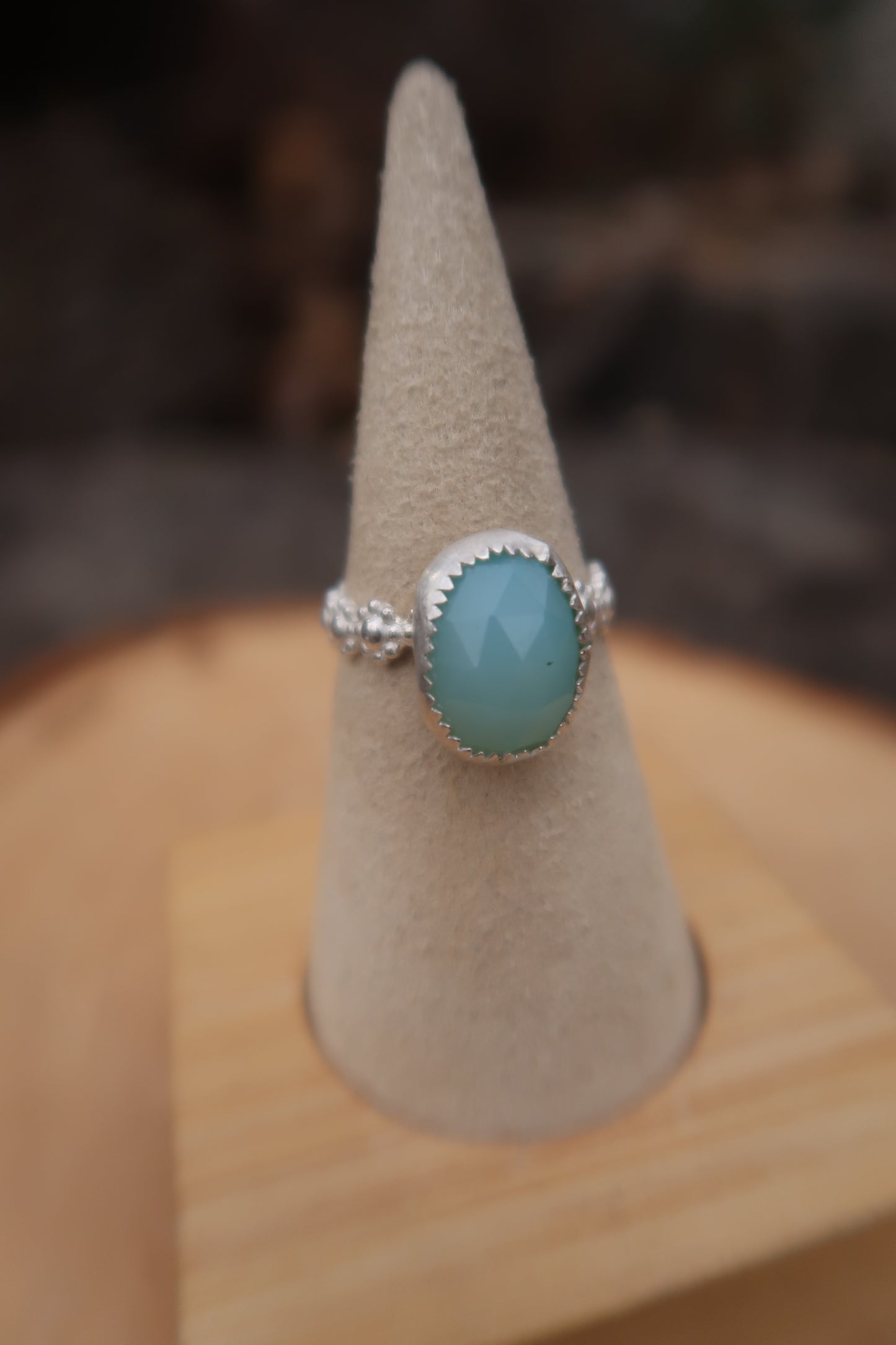 Aquamarine with daisy band size 7