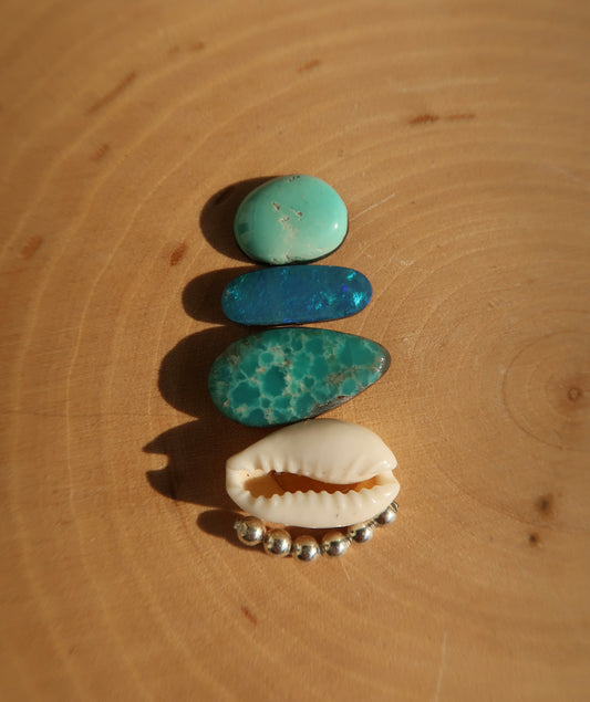 Turquoise, opal and cowrie shell