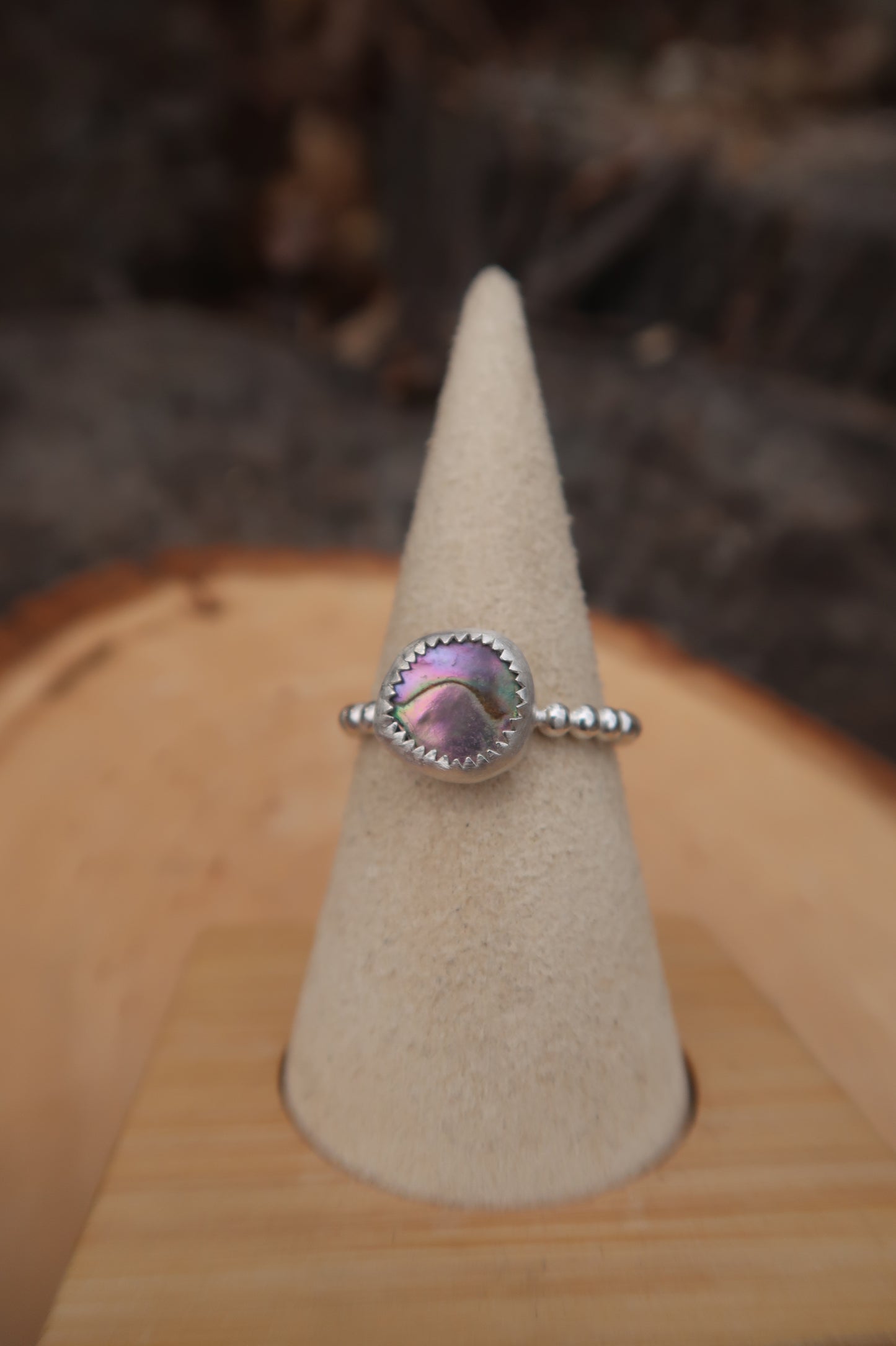 Pink abalone on beaded band size 8