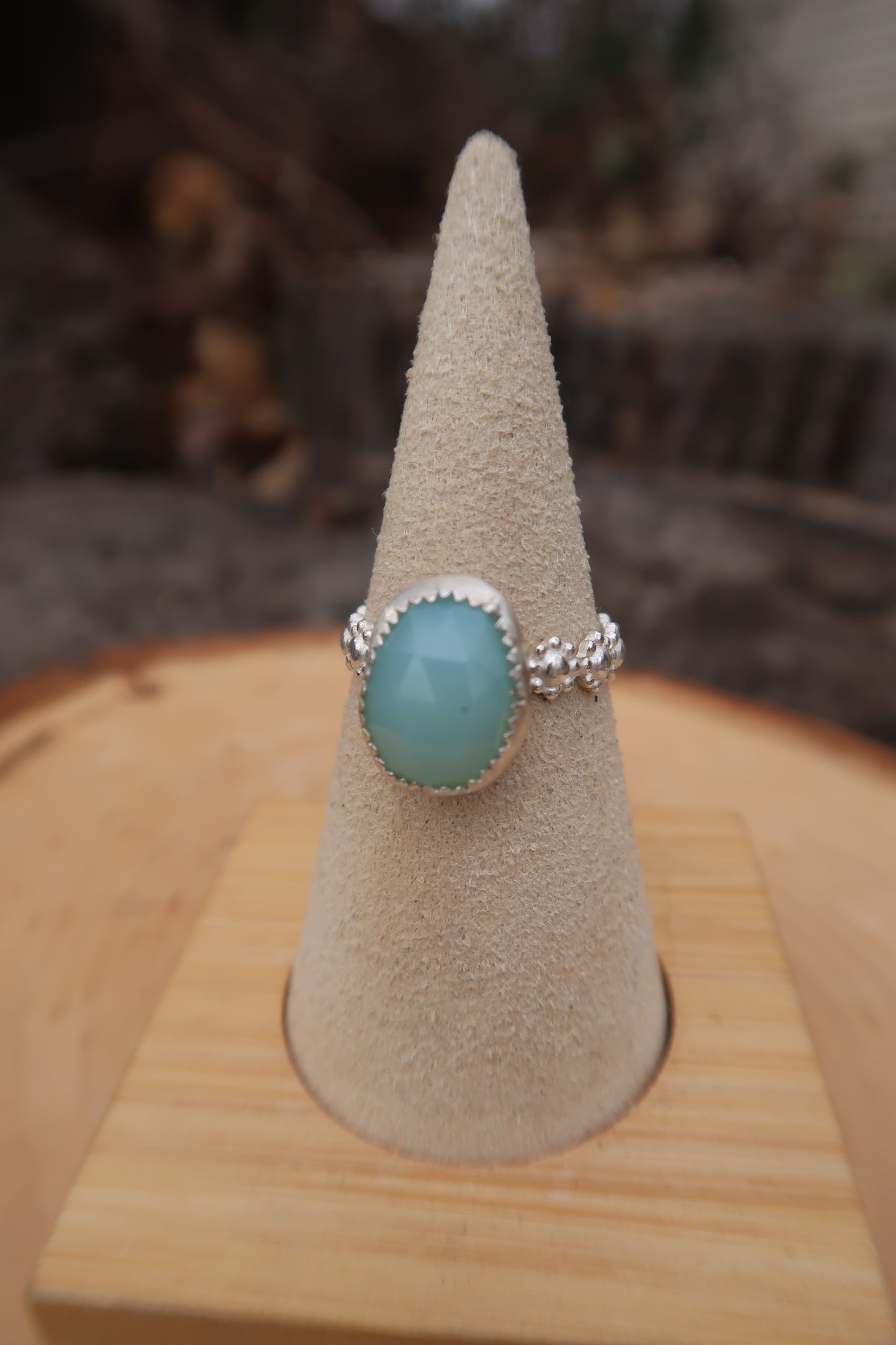 Aquamarine with daisy band size 7