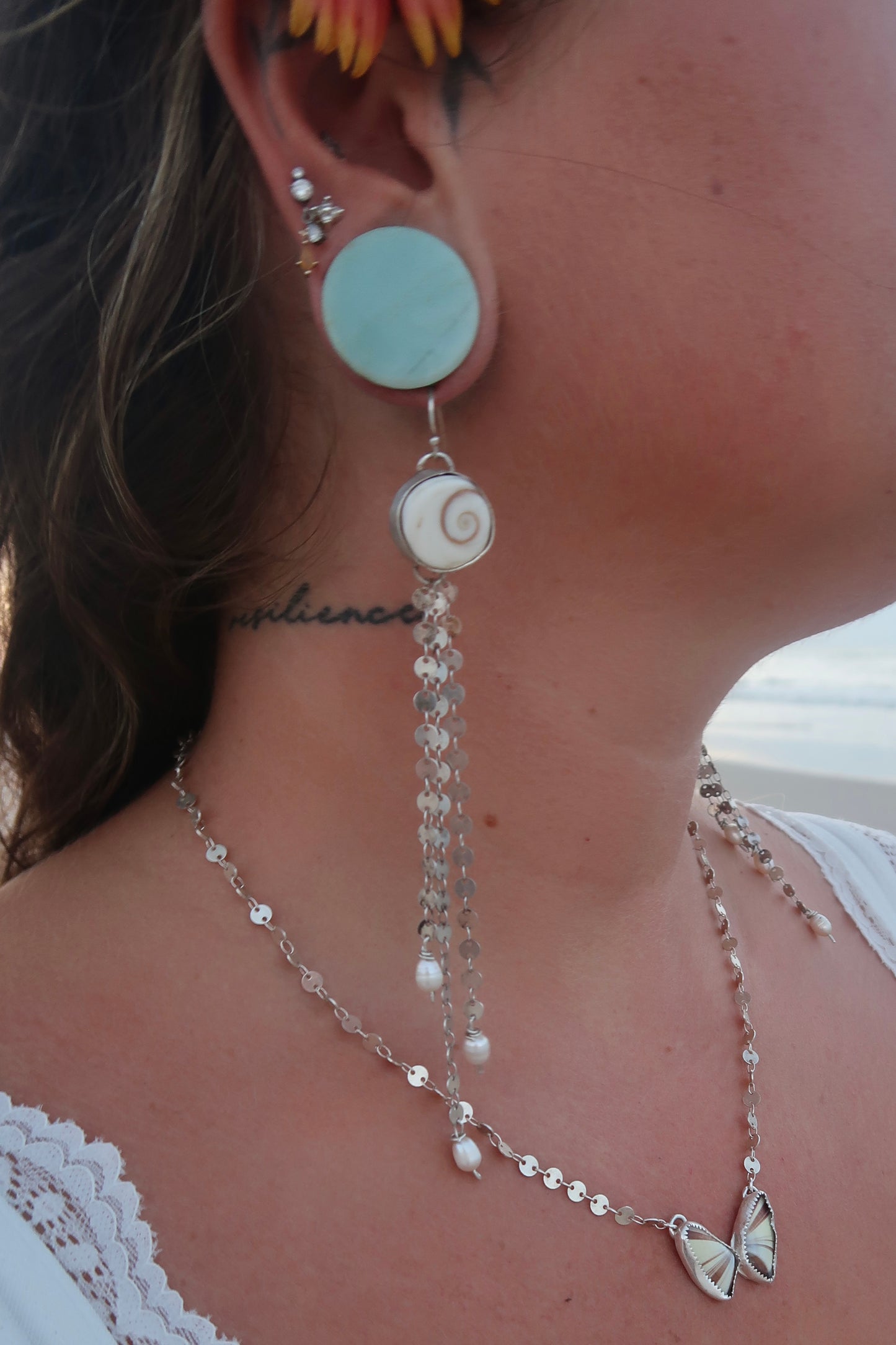 Shiva shell and pearl dangle earrings
