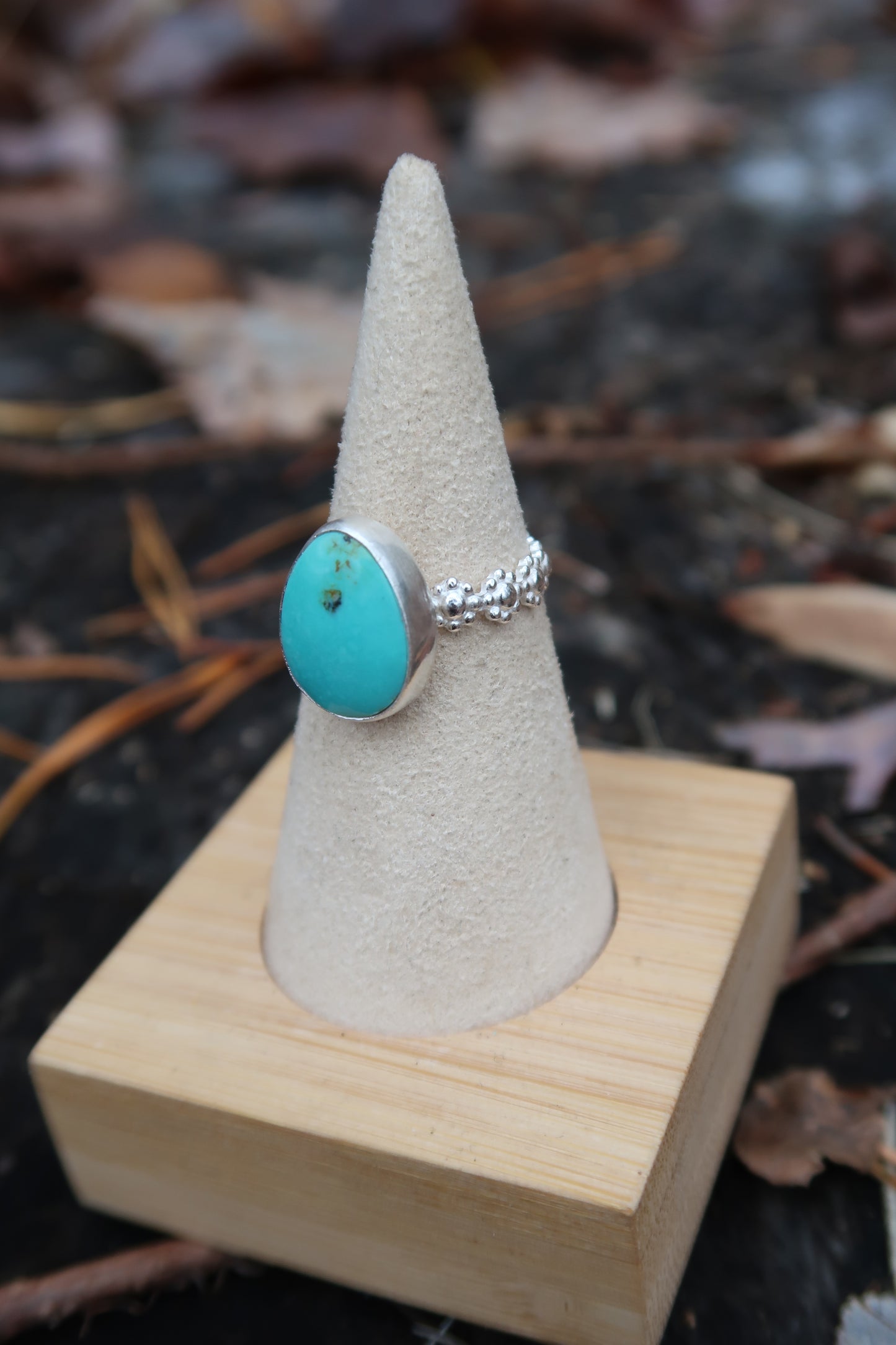 Turquoise with daisy band size 6.5