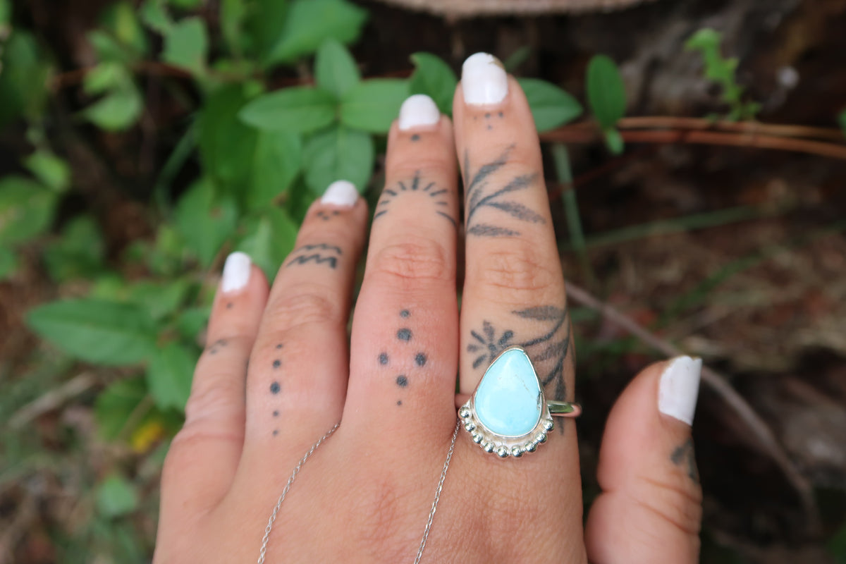 Turquoise teardrop with beaded size 11