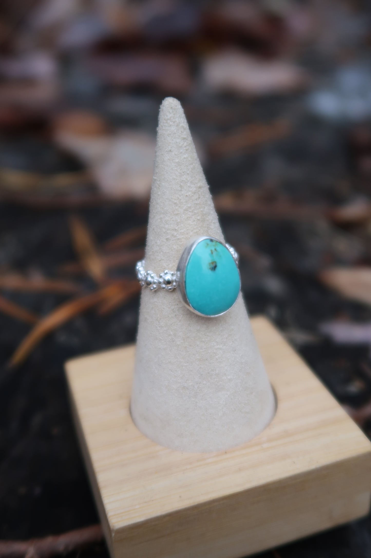 Turquoise with daisy band size 6.5