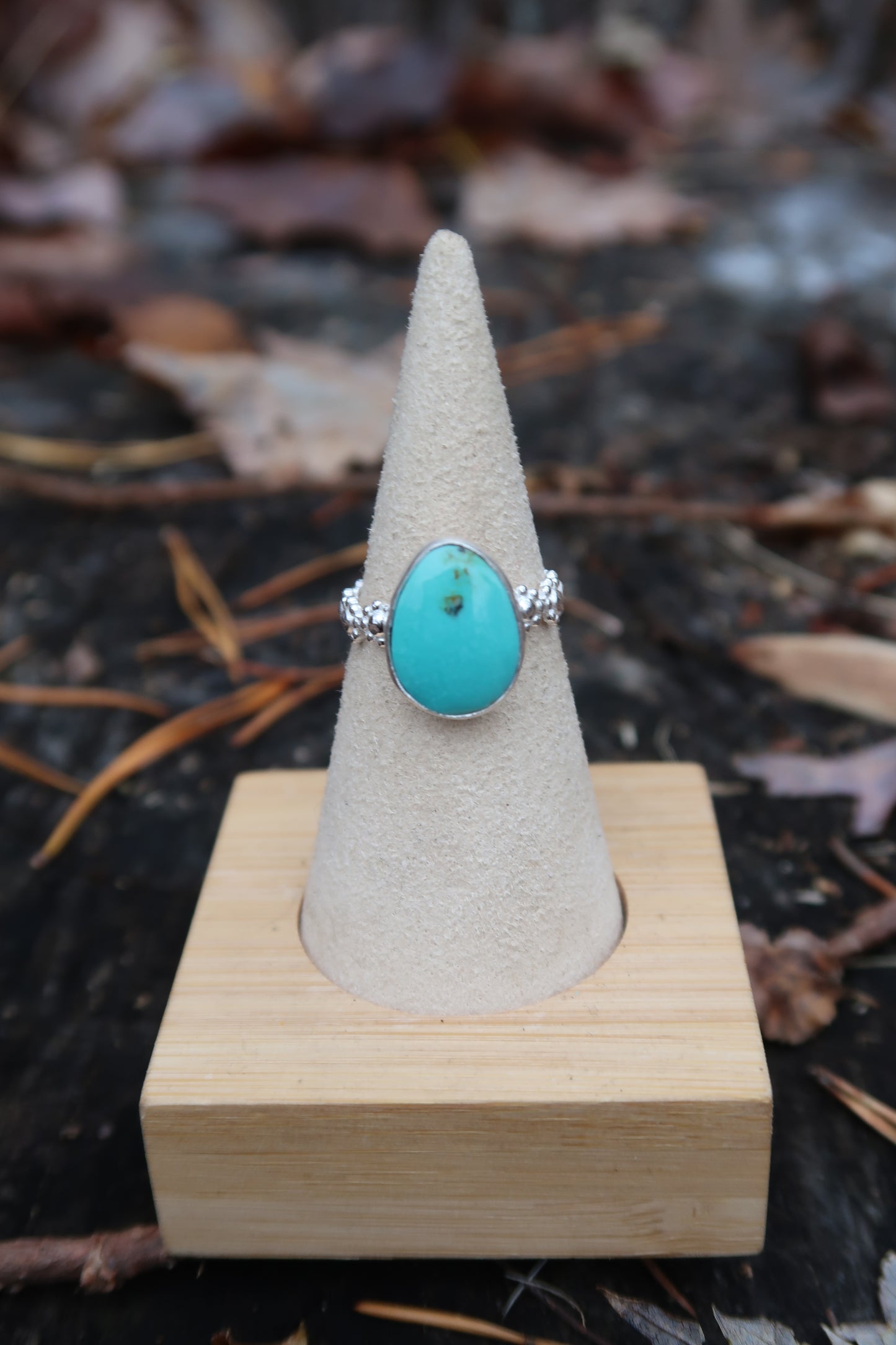 Turquoise with daisy band size 6.5