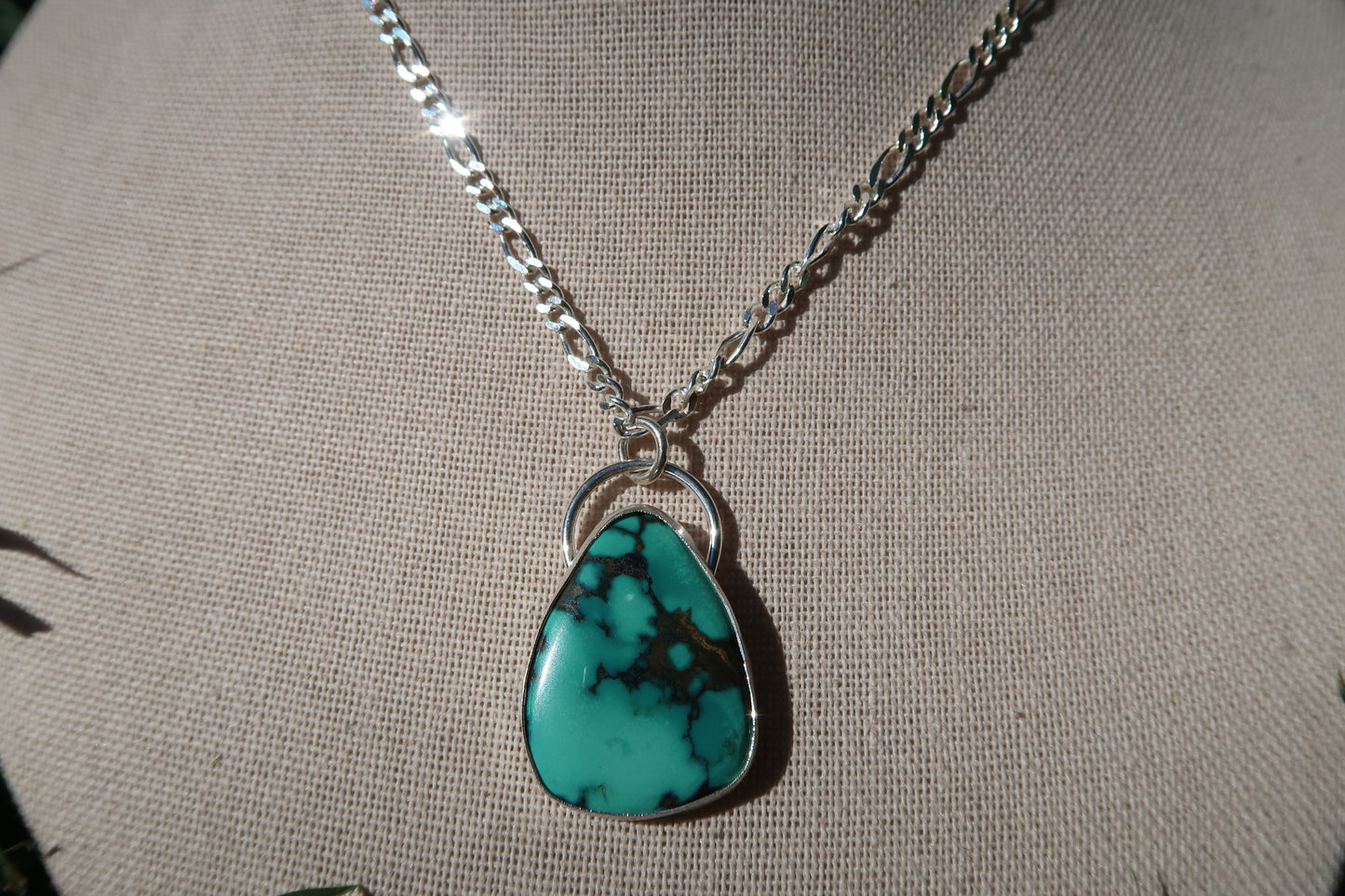 Turquoise necklace on figaro chain