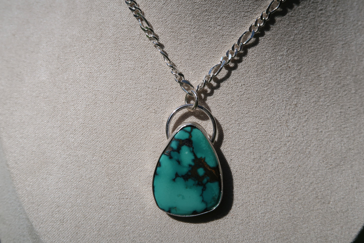 Turquoise necklace on figaro chain