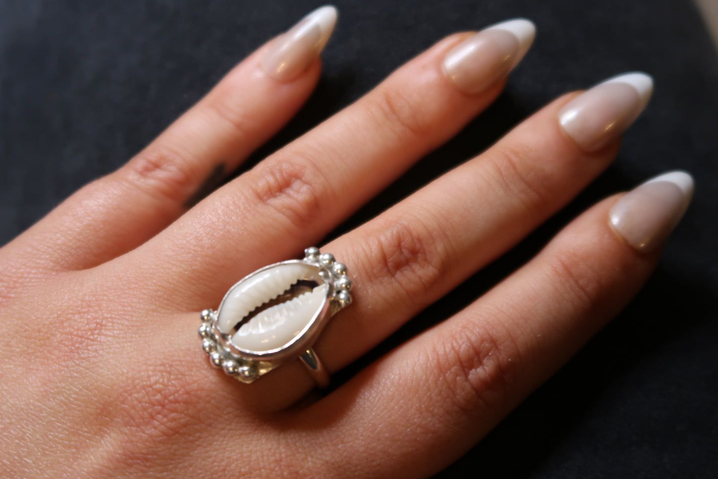 Queen cowrie ring size 7
